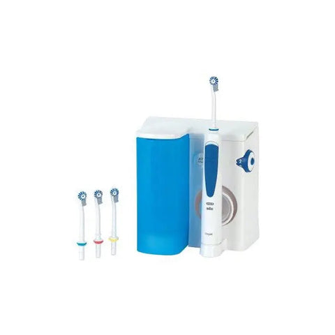 Oral B Oxyjet Professional Dental Irrigator by Jag Couture London New York, showing the sleek water flossing device in use.