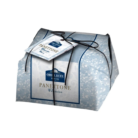Hand-wrapped Ore Liete Panettone by Jag Couture London New York, traditional Italian holiday bread, presented as a gift.