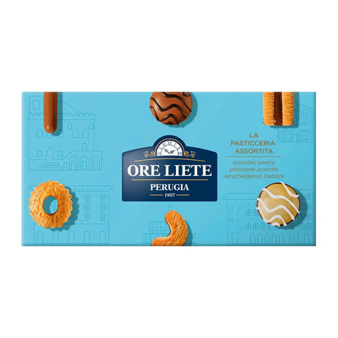 Assorted Ore Liete Pasticceria biscuits in a blue carton from Jag Couture London New York, showcasing a variety of fine baked treats inside.