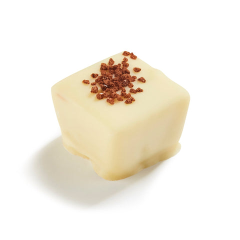 Anton tiramisu flavored milk ganache in white chocolate, 13.4g, from Jag Couture London, shown in a close-up image.