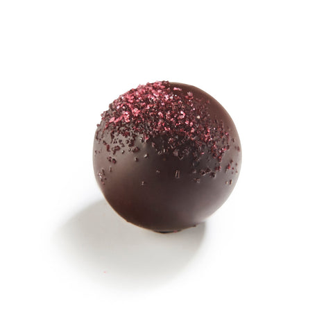 Jill dark chocolate praline with raspberry-flavored ganache by Jag Couture London, 14g, showcasing the elegant chocolate treat.