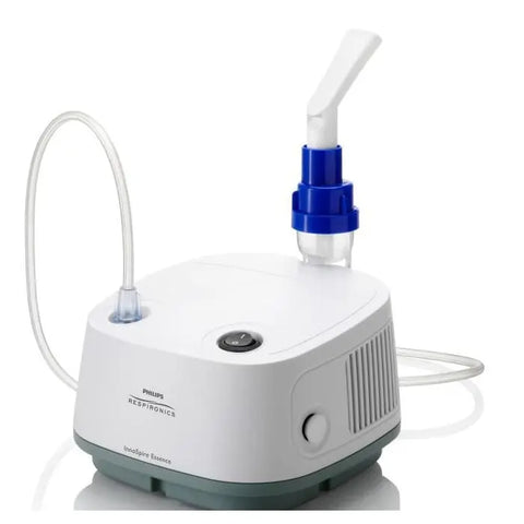 Philips Innospire Essence Nebulizer on a countertop, compact medical device for respiratory treatment.
