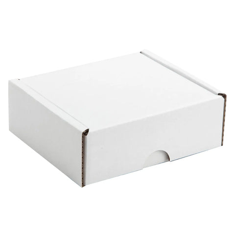 Jag Couture London-New York postal outer designed to fit a 4 chocolate box, with a sleek, protective exterior for mailing.