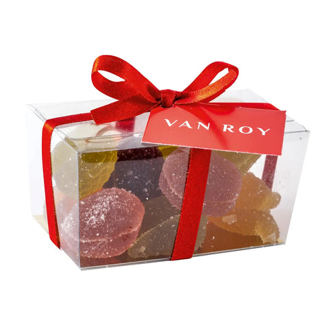 Assorted Belgian pâte de fruit candies in a clear cello ballotin with a ribbon from Jag Couture London-New York.