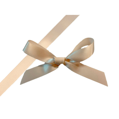 Oyster single-faced satin ribbon by Jag Couture London New York, shown in a close-up image.