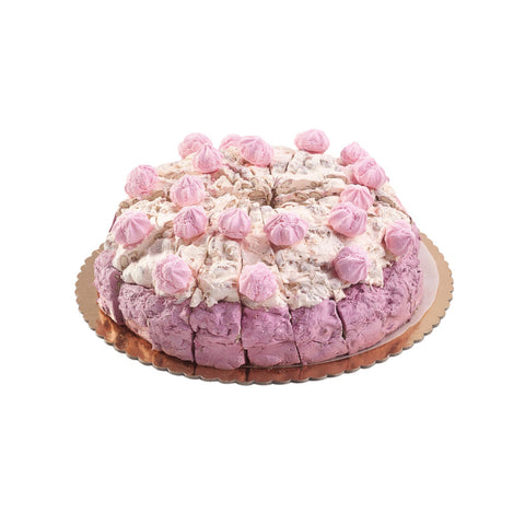 Handmade strawberry meringue flavored soft nougat cake by Jag Couture London New York, showing a layered, textured dessert with strawberries.