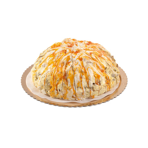 Frosted lemon-flavored handmade soft nougat cake by Jag Couture London - New York, showing a beautifully decorated slice with lemon frosting.