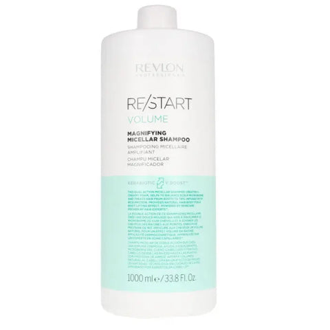 Revlon Re-Start Volume Magnifying Shampoo 1000ml in a clear bottle, with vibrant label, displayed on a bathroom shelf.