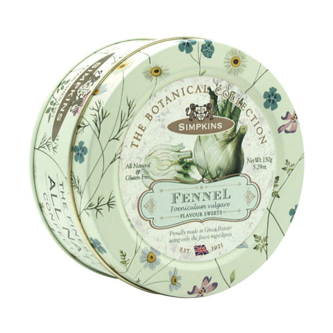Botanical tin of fennel-flavored travel sweets by Jag Couture London New York, featuring colorful packaging and assorted candies inside.