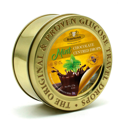 Gold embossed tin of Jag Couture London - New York chocolate-centered mint travel sweets, with decorative packaging.