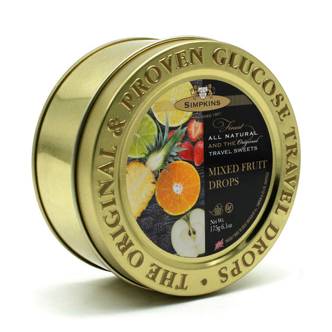 Gold embossed tin of Jag Couture London mixed fruit flavor travel sweets with colorful packaging and decorative design.