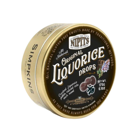 Gold tin of Nipit travel sweets with original liquorice flavor from Jag Couture London - New York.