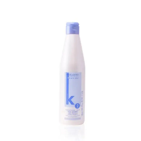Salerm Cosmetics Keratine Shot Straightening Cream 500ml in a white tube with a blue cap, designed for hair smoothing and straightening.