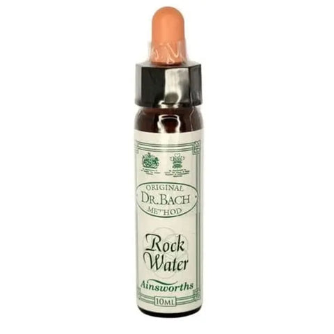 Santiveri Bach Rock Water 10ml bottle, natural mineral water with herbal infusion, held in a hand.