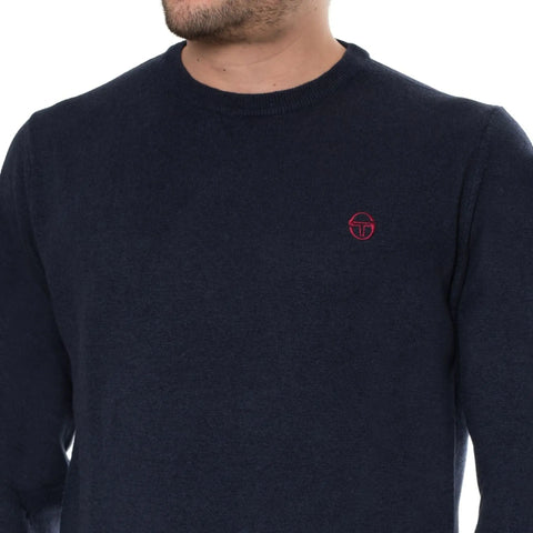 Blue Sergio Tacchini X073_10310020_ tennis shirt with logo, displayed on a neutral background.