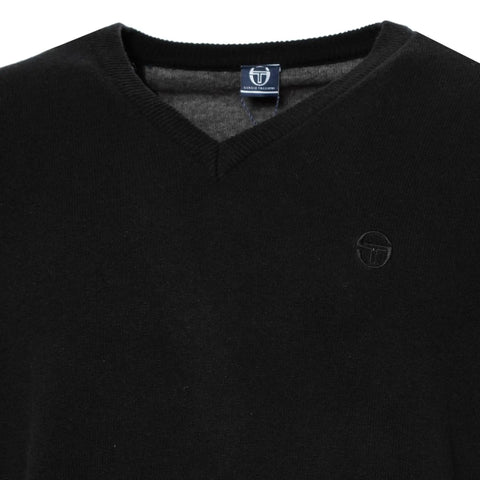 Sergio Tacchini jacket with logo detail, black and white, from Jag Couture London New York collection, displayed on a hanger.