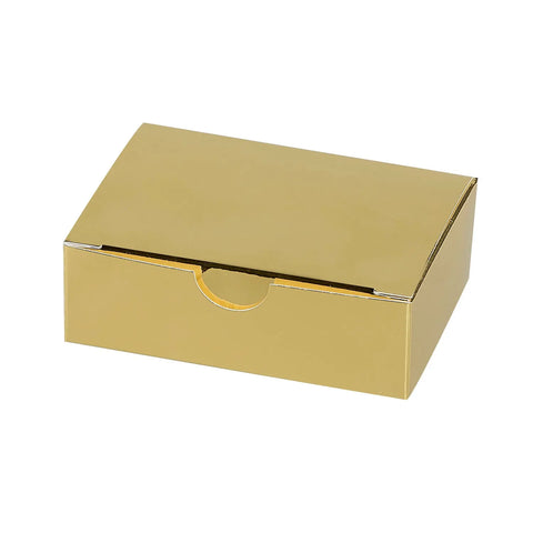 Shiny gold 6-chocolate box with locking top from Jag Couture London New York, elegant and luxurious gift packaging.