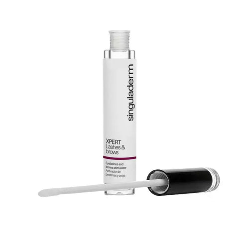Singuladerm Xpert Eyelashes and Eyebrows serum in a 4ml bottle, displayed with a sleek design and branding from Jag Couture London New York.