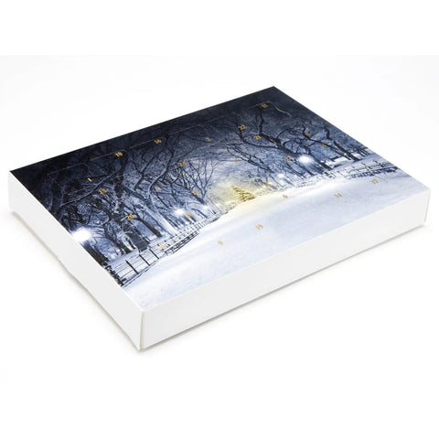 Snow-in-the-park design empty advent calendar by Jag Couture London, featuring 24 chocolate compartments, 192x32.5x252mm.
