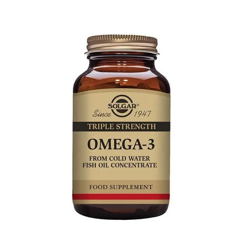 Solgar Omega-3 Triple Concentrate capsules in a bottle with label detailing 50 capsules, displayed on a neutral background.