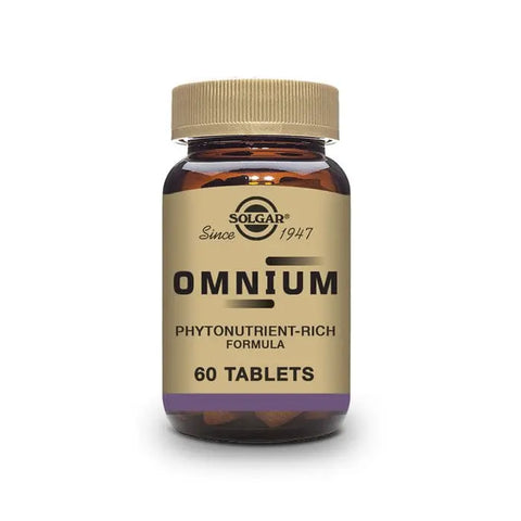 Solgar Omnium dietary supplement capsules in a bottle, with branding from Jag Couture London New York.