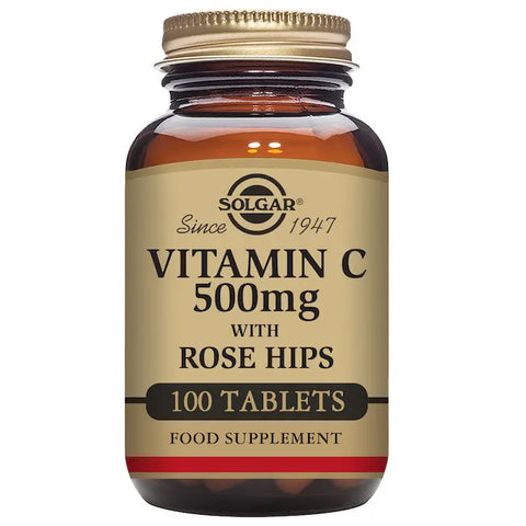 Solgar Vitamin C with Rose Hips 500mg, 100 tablets, dietary supplement in a white bottle with label.