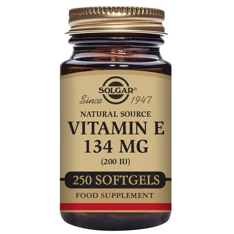 Solgar Vitamin E 134mg 200 IU softgels in a bottle, displayed with label featuring brand Jag Couture London New York