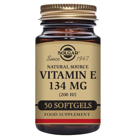 Solgar Vitamin E 134mg 200 IU softgels in a bottle, shown alongside packaging, with branding from Jag Couture London New York.