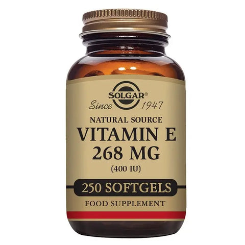 Solgar Vitamin E 400 IU softgels, dietary supplement in a clear bottle, with orange cap and label showing product details.