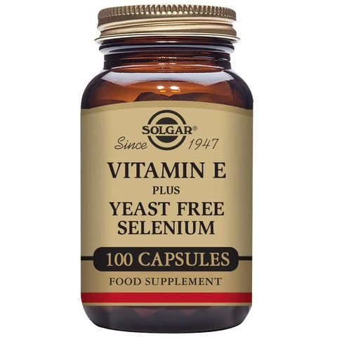 Solgar Vitamin E with Selenium 100 capsules bottle shown, featuring label with product details and brand name Jag Couture London New York.