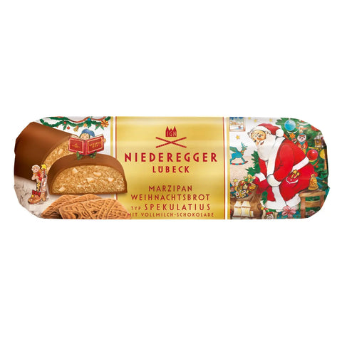 Speculoos loaf with spiced biscuit, marzipan, and milk chocolate coating by Jag Couture London New York