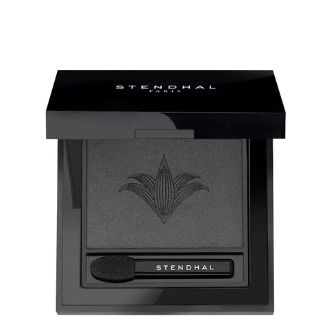 Stendhal Magnifying Eyeshadow 502 Graphite in 2.5g jar, showcasing dark gray, shimmery eyeshadow from Jag Couture London-New York.