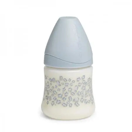 Suavinex baby bottle with 3-position silicone nipple, 150ml capacity, suitable for newborns, featuring a sleek design by Jag Couture London.