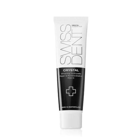 Swissdent Crystal Repair and Whitening Toothpaste 100ml from Jag Couture London New York, featuring a sleek tube with blue and white packaging.