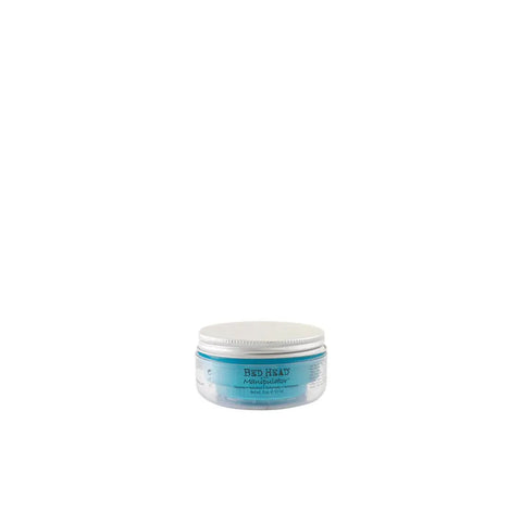 Tigi Bed Head Manipulator texturizer 57ml in a clear container, designed to add texture and style to hair, by Jag Couture London New York.