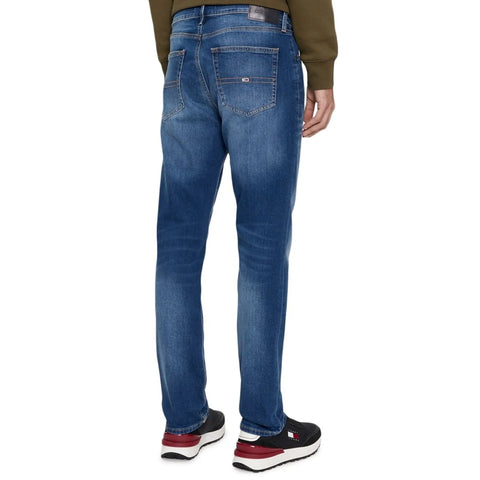 Tommy Hilfiger X073 DM0DM09551-1A5 denim jacket by Jag Couture London New York, shown on a hanger with visible details.
