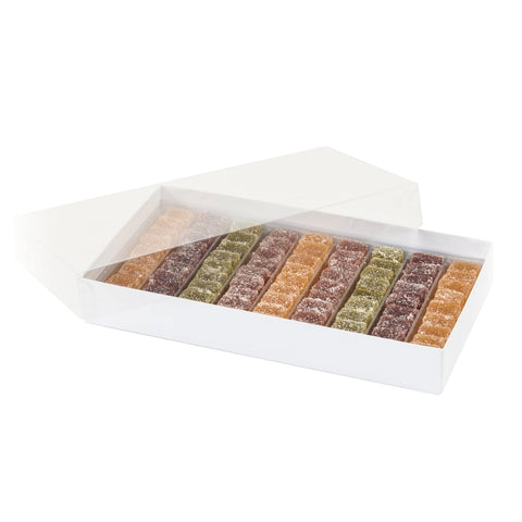 Assorted fruit pâte de fruits cubes with apricot, lemon, strawberry, raspberry, and pear flavors from Jag Couture London - New York.