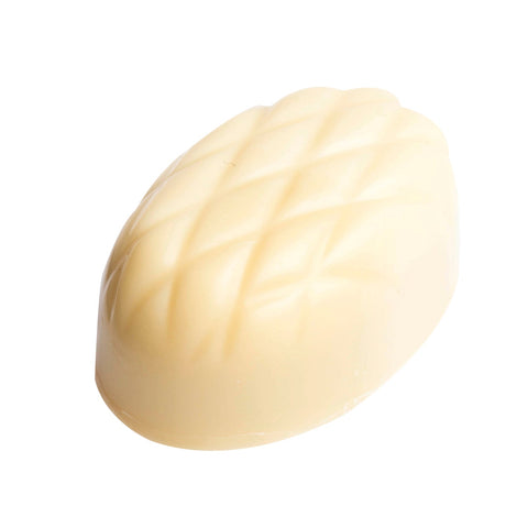 Lemon-flavored praline in white chocolate by Jag Couture London, presented in a 10.2g piece on a white background.