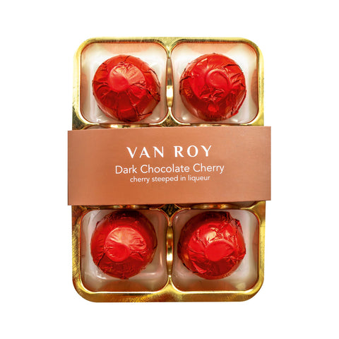 Six Van Roy red foiled cherry liqueurs in dark chocolate shells, packaged in a clear cello wrapper, by Jag Couture London - New York.