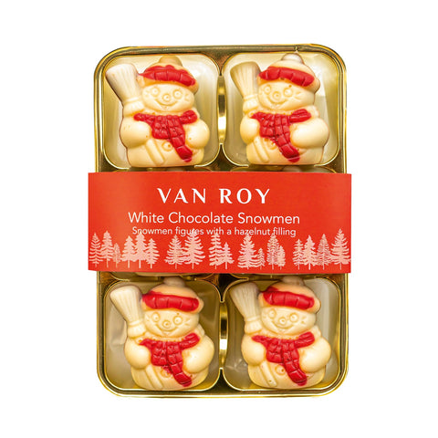 White chocolate snowman figures with hazelnut filling in cello pack by Jag Couture London - New York, perfect for holiday treats.