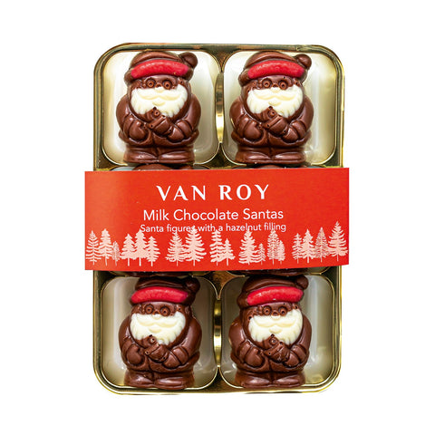 Milk chocolate Santa figures with hazelnut filling in a cello pack by Jag Couture London - New York