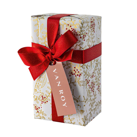 Deluxe Christmas ballotin of Belgian milk chocolates from Jag Couture London - New York, with a menu tag and assorted chocolates inside.