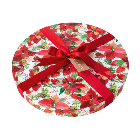 Deluxe round box of assorted Belgian chocolates with poinsettia designs from Jag Couture London New York, 30cm diameter.