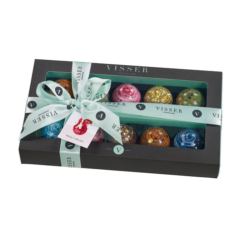 Deluxe gift box of 10 Picasso chocolates by Jag Couture London - New York, featuring a menu tag and assorted artisanal chocolates.