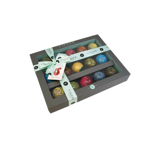 Deluxe gift box of 15 Picasso chocolates by Jag Couture London - New York, with menu tag, showcasing an elegant assortment of chocolates.