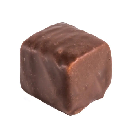 Vanilla Bourbon dark chocolate-covered coconut praline by Jag Couture London, 15g, with rich chocolate coating and coconut interior.
