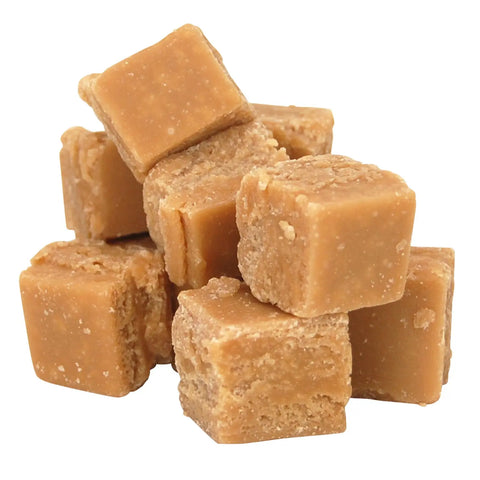 Hand-broken cubes of vegan caramel and sea salt fudge by Jag Couture London New York, showcasing rich, flavored fudge pieces.