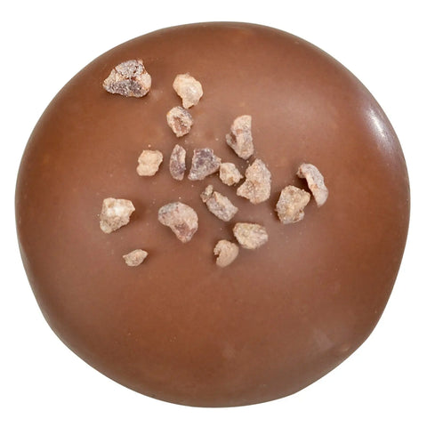 Vigo milk chocolate with soft milk ganache from Jag Couture London New York, 15.2g, shown in close-up with smooth chocolate exterior