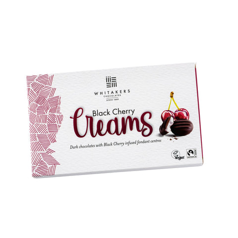 Dark chocolate covered black cherry fondant creams from Whitakers, presented in a carton, by Jag Couture London - New York.