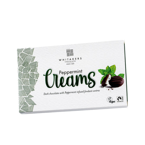Dark chocolate covered peppermint fondant creams in carton by Jag Couture London - New York, showing individually wrapped treats inside.